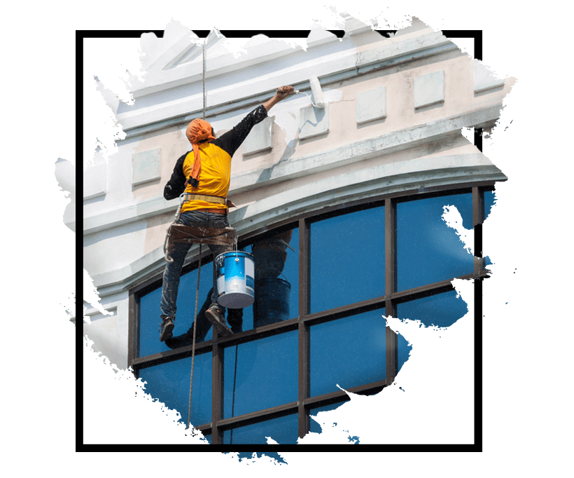 commercial painting – painters applying epoxy floor in a business facility